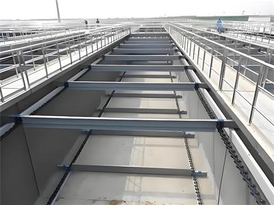 Sludge scraper